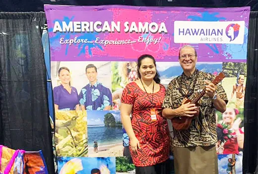 American Samoa Visitors Bureau (ASVB) staffer, Eletino Tuiasosopo-Gurr, and local entertainer, Tui Letuli at the American Samoa booth during the first day of the two-day San Diego Travel and Adventure Trade Show at the San Diego Convention Center, in San Diego, CA Jan. 18-19, 2020.