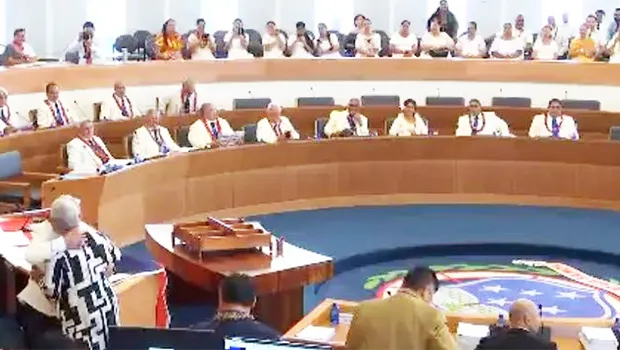 Tuilaepa and Fiame hug at swearing in