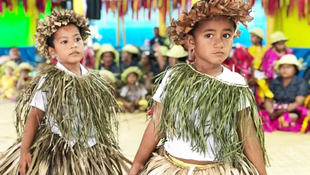 Tuvaluan children sing a welcome for Pacific leaders at Funafuti airport.