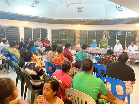 Amata speaking at townhall meeting