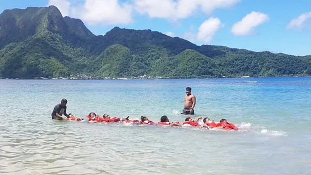 Fishers from the local fleet in American Samoa practice creating a human chain 