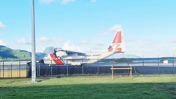 USCG plane on runway at ppg