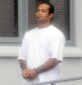 Eddieboy Vaavale in handcuffs