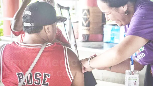 Man getting COVID-19 vaccine