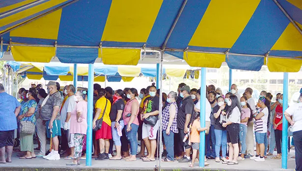 People crowding into vaccination site with no social distancing
