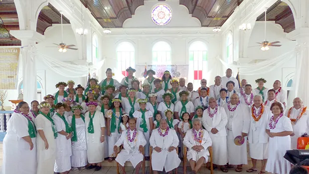 Vailoatai Choir, church and traditional leaders pose in the church