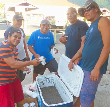 Men from Vatia yesterday morning selling “palolo” at the Fagatogo Market Plac