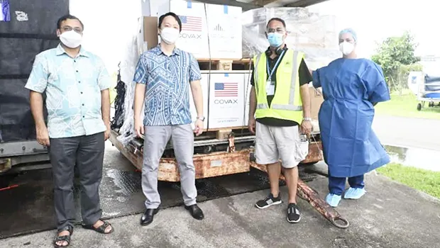 Sanoa govt officials accepting the U.S. vaccine donation