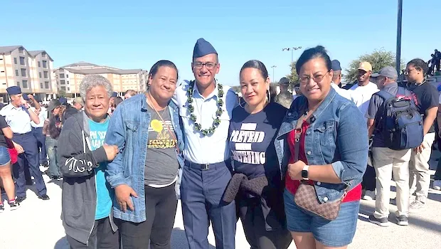 Vincent M.J. Laupola with family members