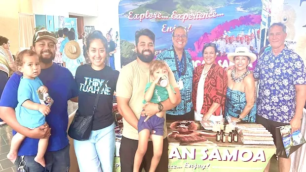 visitor's bureau staff greeting Samoans from around the world