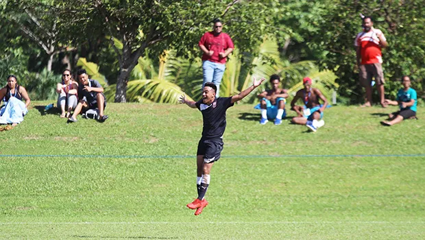 Walter Pati of American Samoa celebrates after scoring the