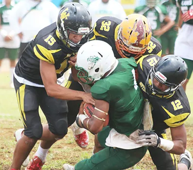 Leone Lions’ Joshua Taani being swallowed in the backfield by