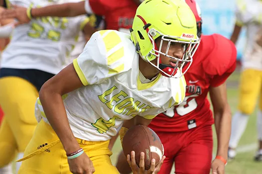 Oakland ‘Oakie’ Salave’a scrambling to take this one for a huge Lions first down during the first quarter of their JV match up against the Vikings. 