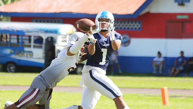 A pass intended for Avory Seumanutafa is deflected by Alex Peric