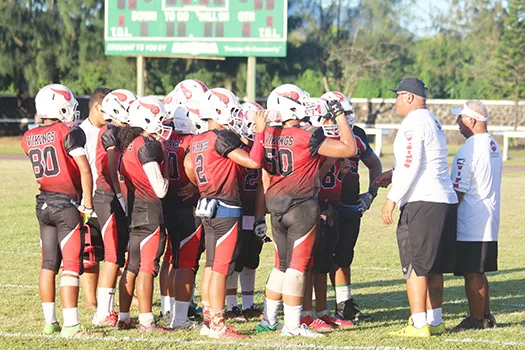 Coaches Jimmy Grey and Meafou Sagapolutele of the JPS Vikings speaking to their players