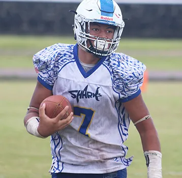 Samoana High School’s JV quarterback, Viliamu Tanielu 