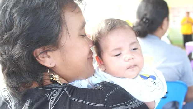 Mother and child at World Breastfeeding Week event