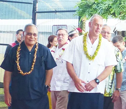 Assistant Interior Secretary for the Insular Areas Douglas Domenech in the background between Gov. Lolo Matalasi Moliga and former Interior Secretary Ryan Zinke 
